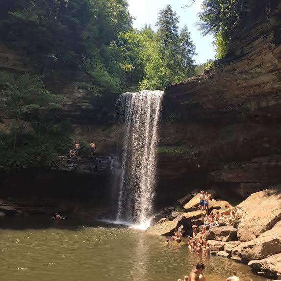 8 Hikes with Waterfalls Near Nashville, TN: Greeter Falls's rocky hideout had a lot of visitors on this sunny summer day
