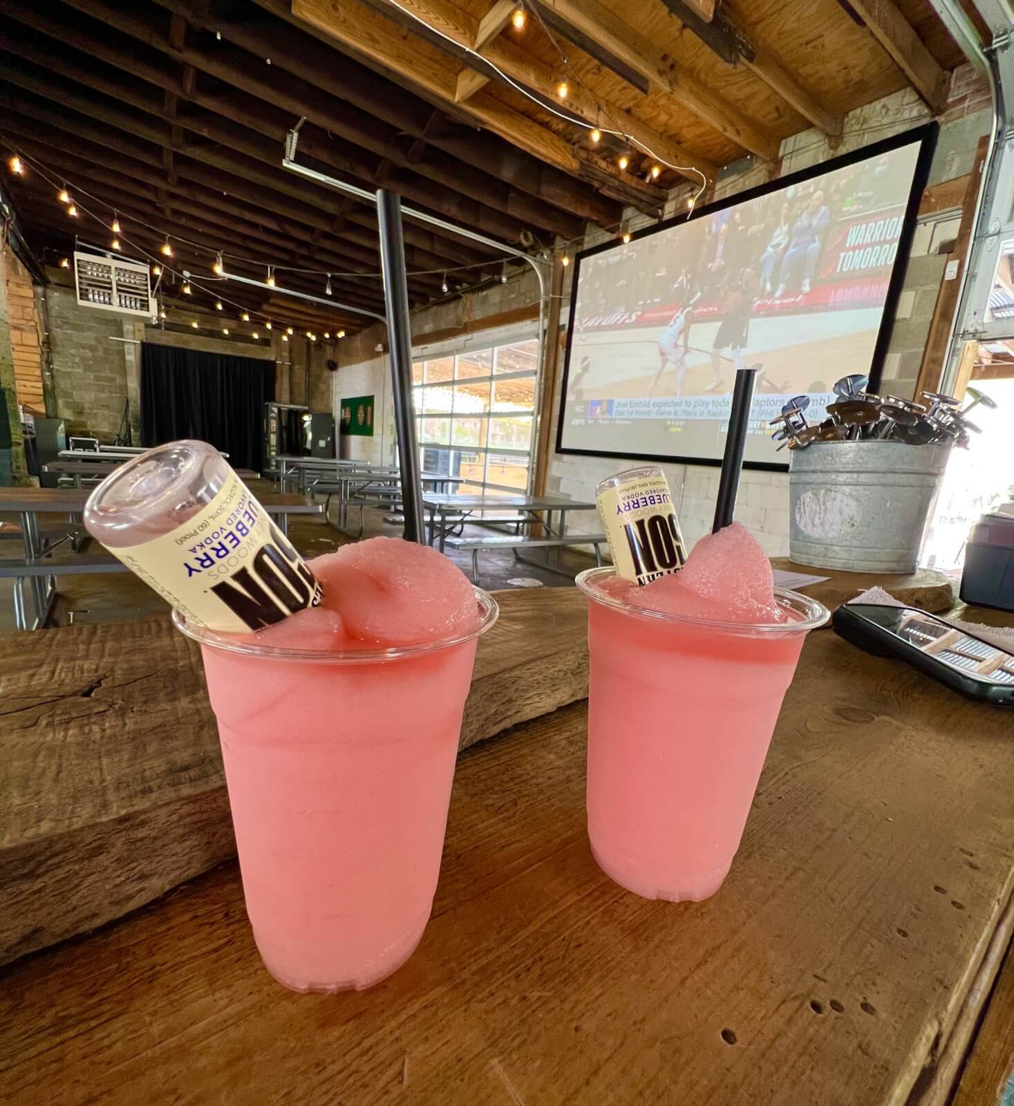 Two frozen rosés on the indoor patio of Loflin Yard with an extra shot of blueberry vodka. 