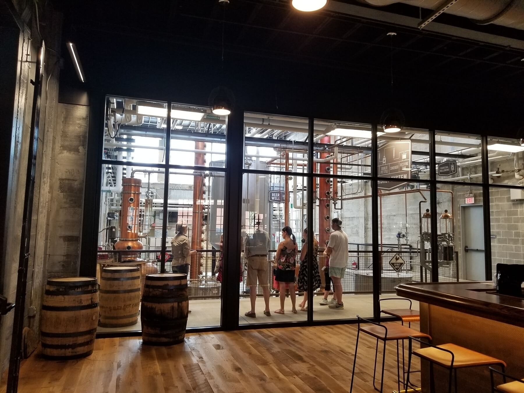 Group of people touring Old Dominick Distillery.