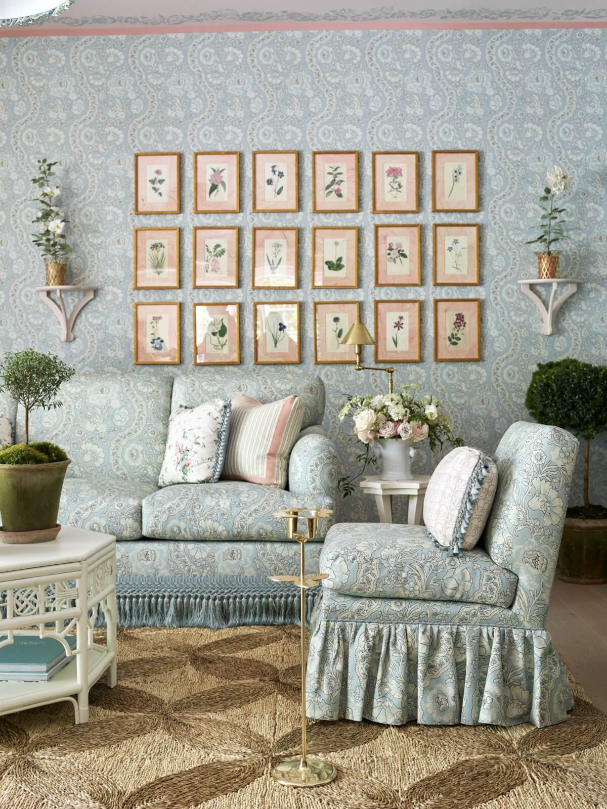 Lower Lounge with pale blue wallpaper and matching sofas
