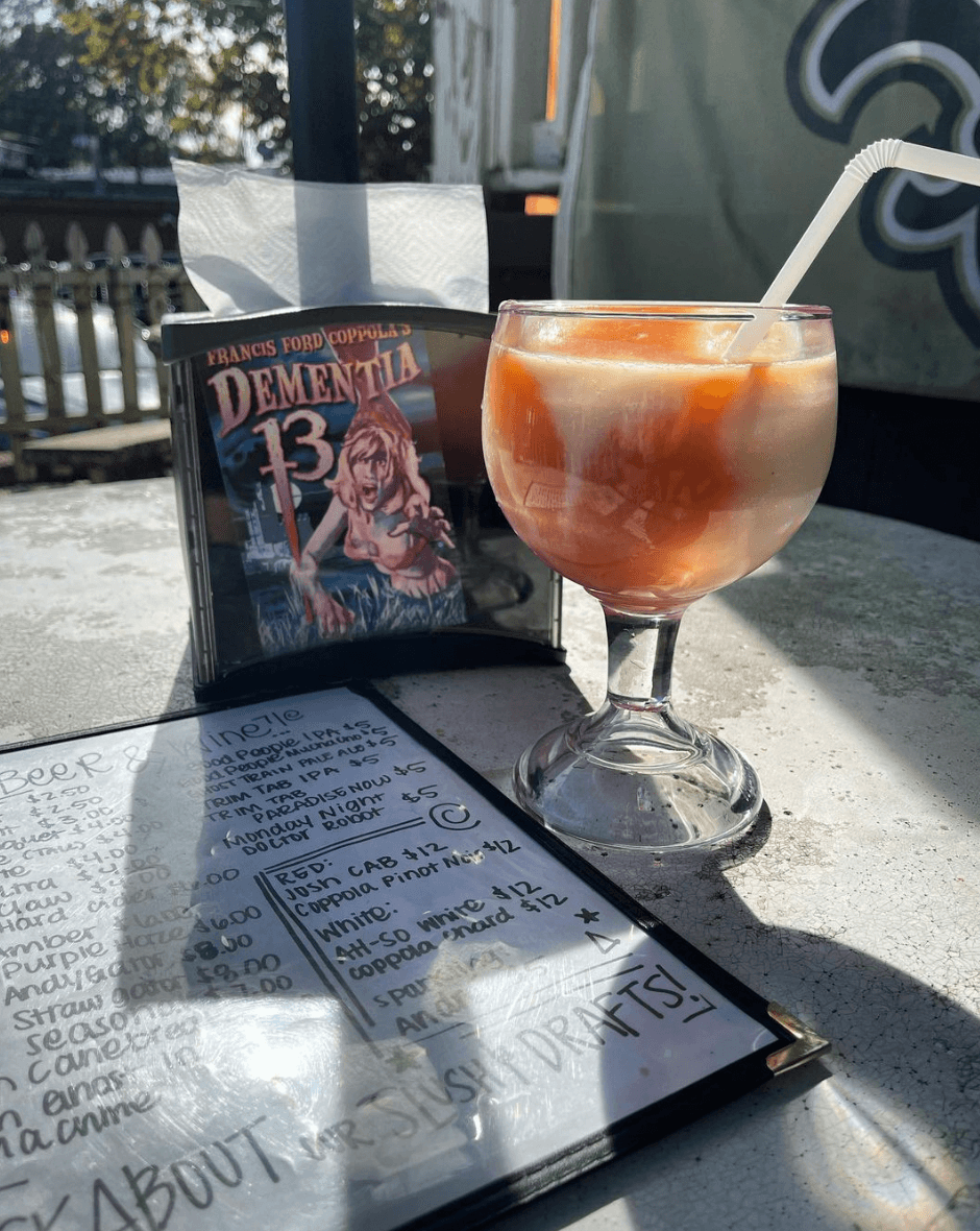 frozen cocktail by a menu