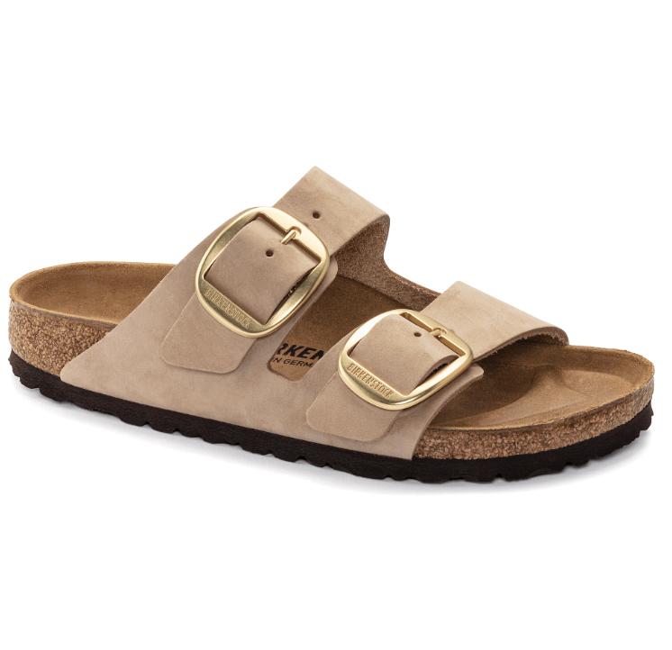 Birkenstock tan double-strap sandals with big, gold buckles